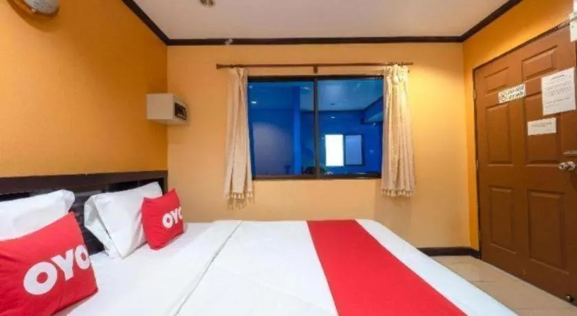 Bed in OYO 75327 Diyana Residence