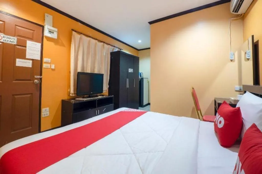 Bed in OYO 75327 Diyana Residence