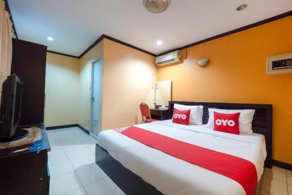 Bed in OYO 75327 Diyana Residence