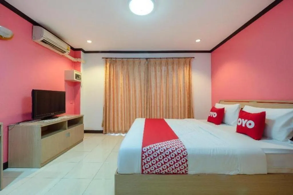 Bed in OYO 75327 Diyana Residence