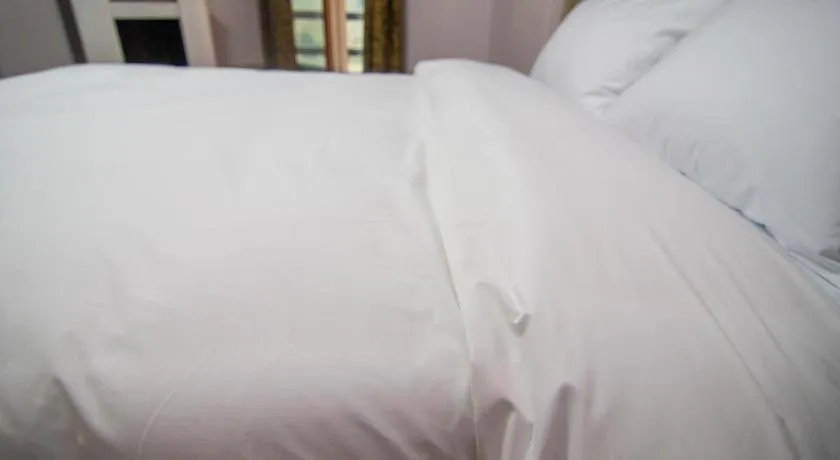 Bed in Hyundai Elliot Hotel and Resort