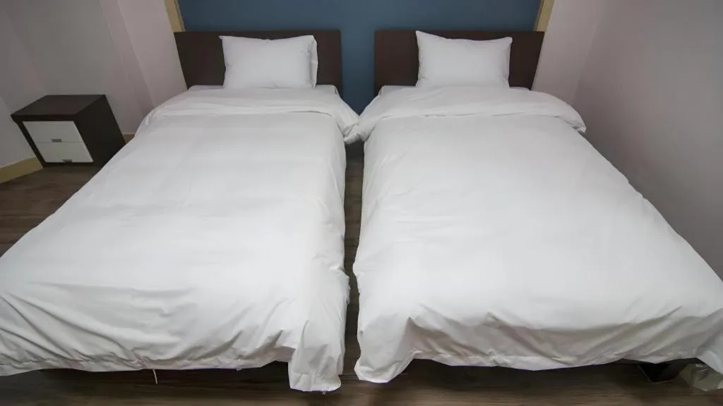 Bed in Hyundai Elliot Hotel and Resort