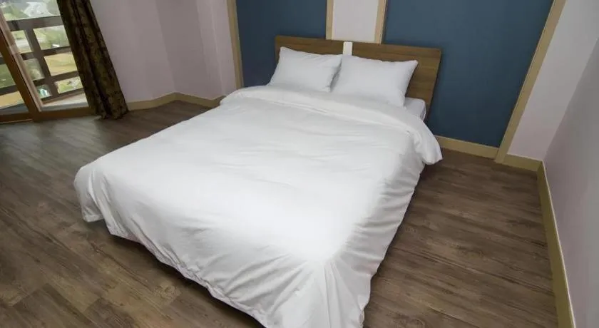 Bed in Hyundai Elliot Hotel and Resort