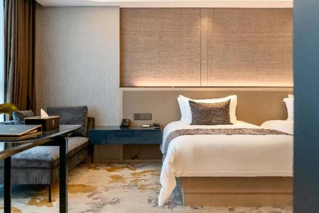 Bed in Taiyi International Hotel