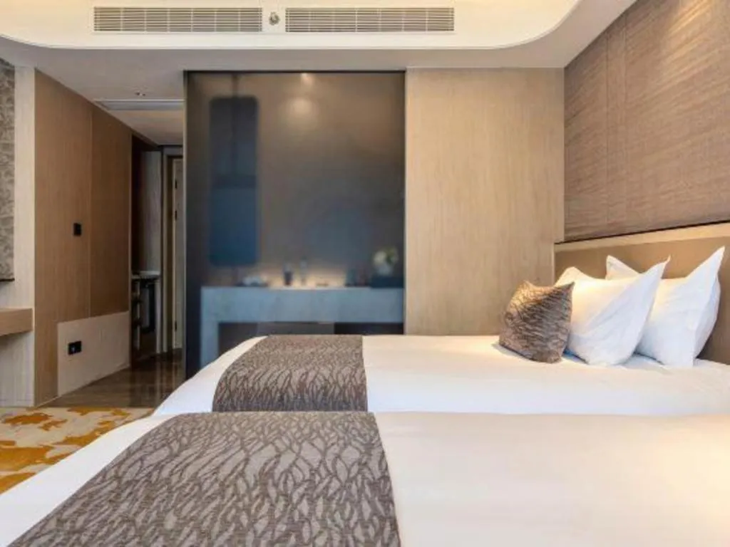 Bed in Taiyi International Hotel