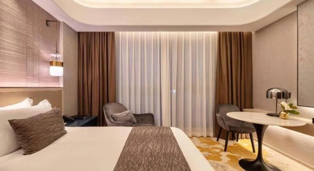 Bed in Taiyi International Hotel