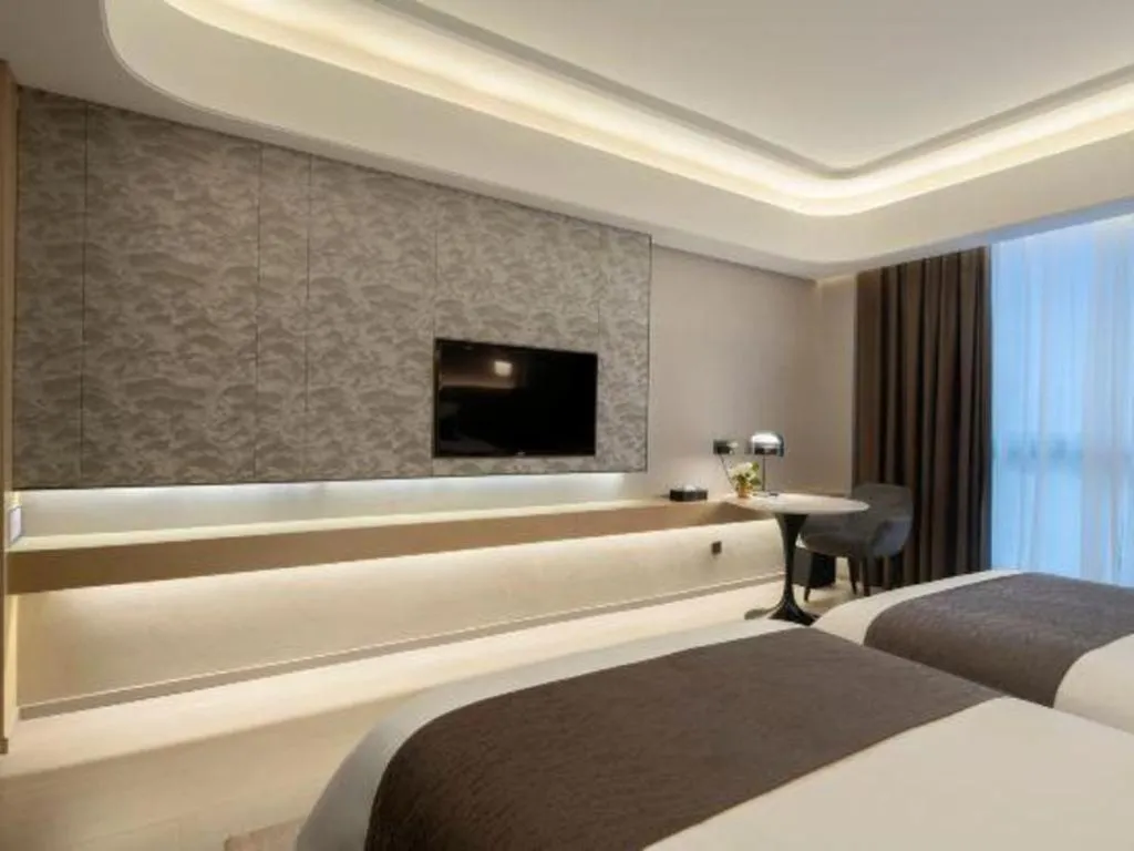 Bed in Taiyi International Hotel