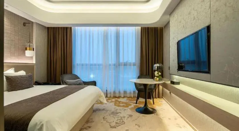 Bed in Taiyi International Hotel Bed in Taiyi International Hotel