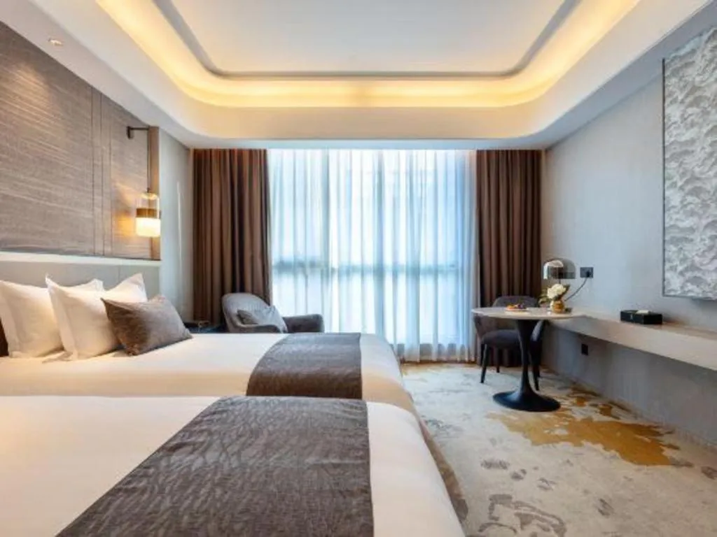 Bed in Taiyi International Hotel