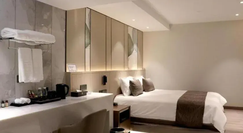 Bed in Taiyi International Hotel Bed in Taiyi International Hotel