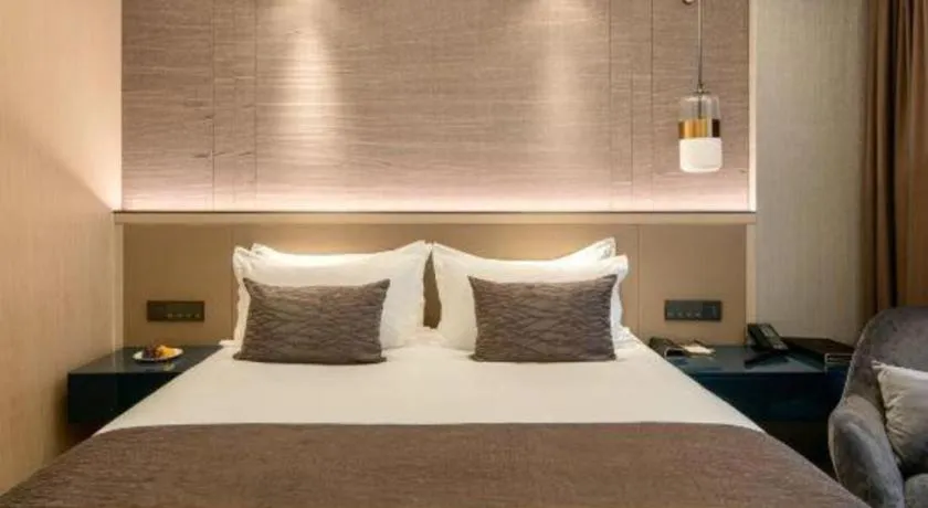 Bed in Taiyi International Hotel