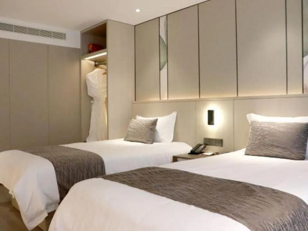 Bed in Taiyi International Hotel