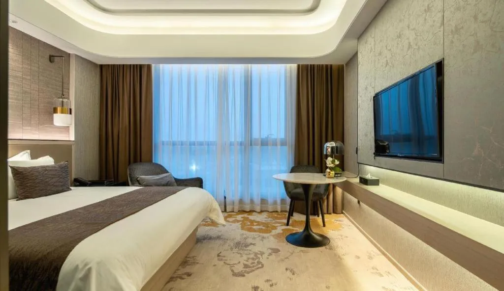 Bed in Taiyi International Hotel