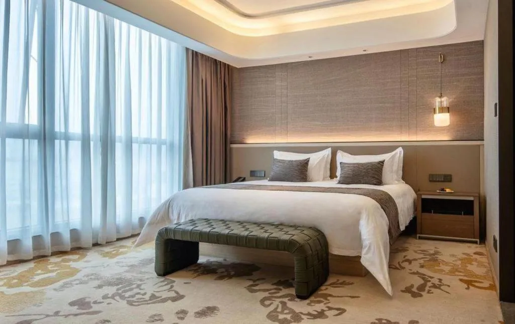 Bed in Taiyi International Hotel