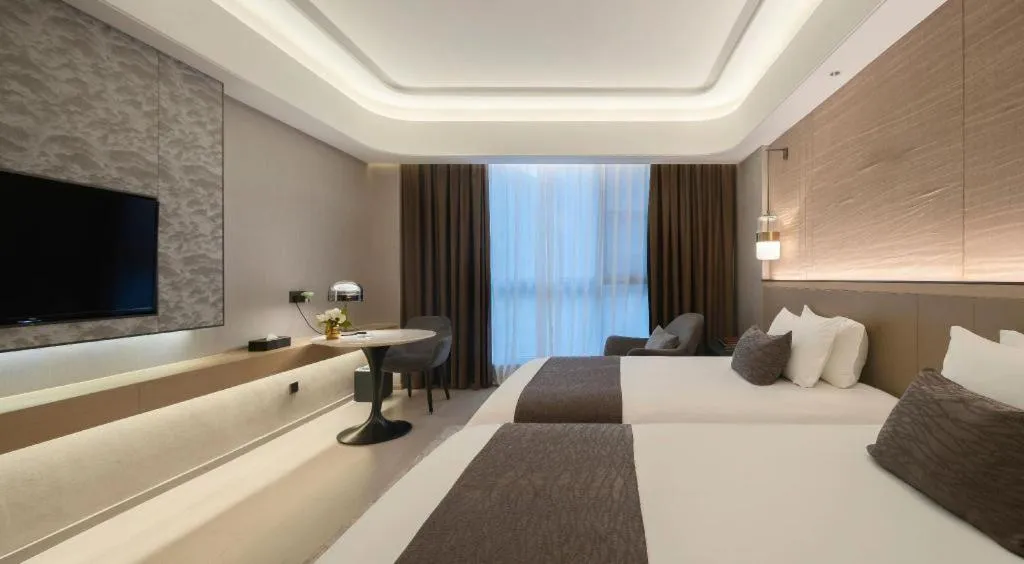 Bed in Taiyi International Hotel