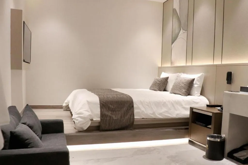 Bed in Taiyi International Hotel