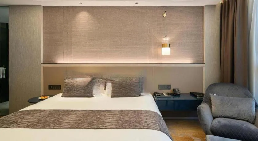 Bed in Taiyi International Hotel