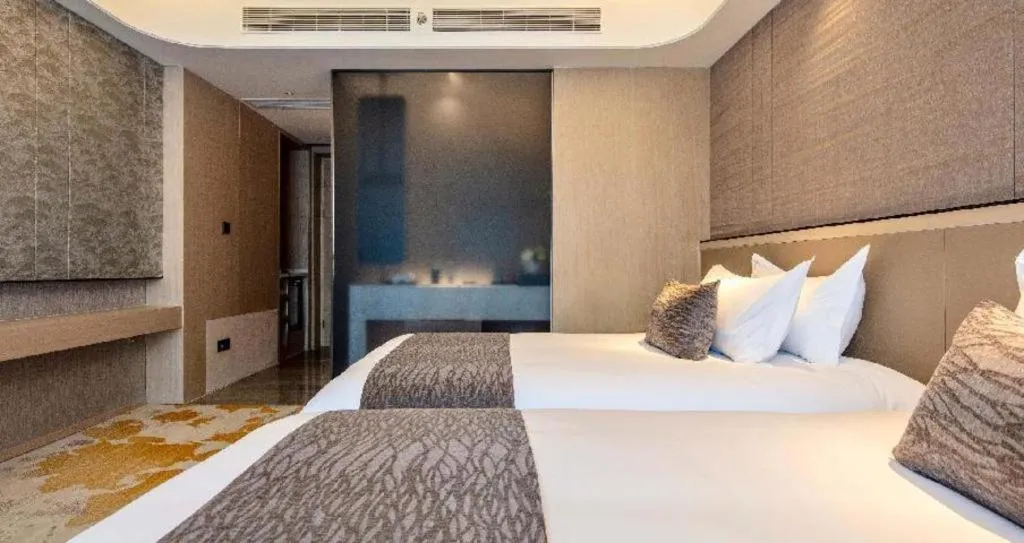 Bed in Taiyi International Hotel