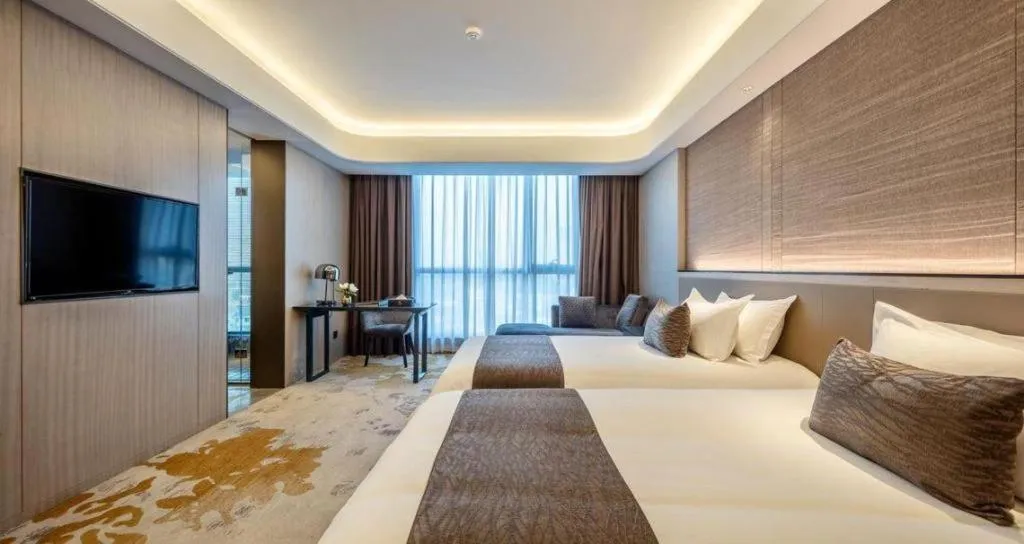 Bed in Taiyi International Hotel