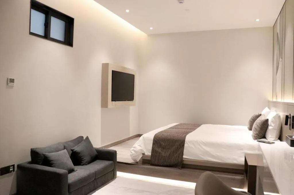 Bed in Taiyi International Hotel