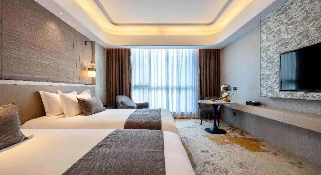 Bed in Taiyi International Hotel