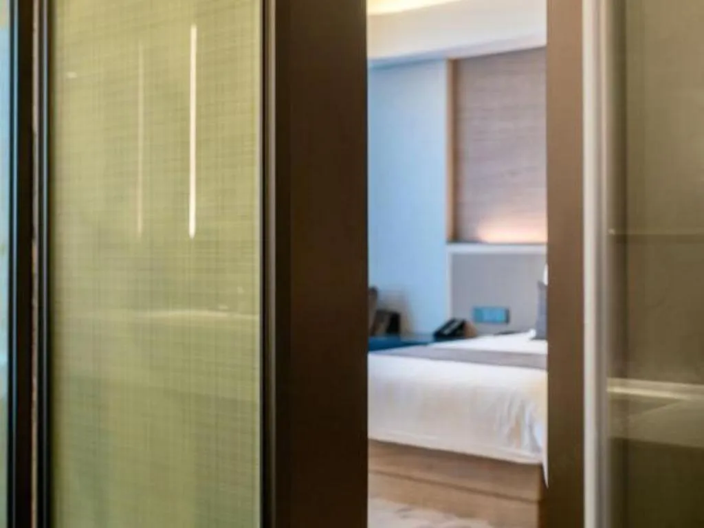 Bed in Taiyi International Hotel