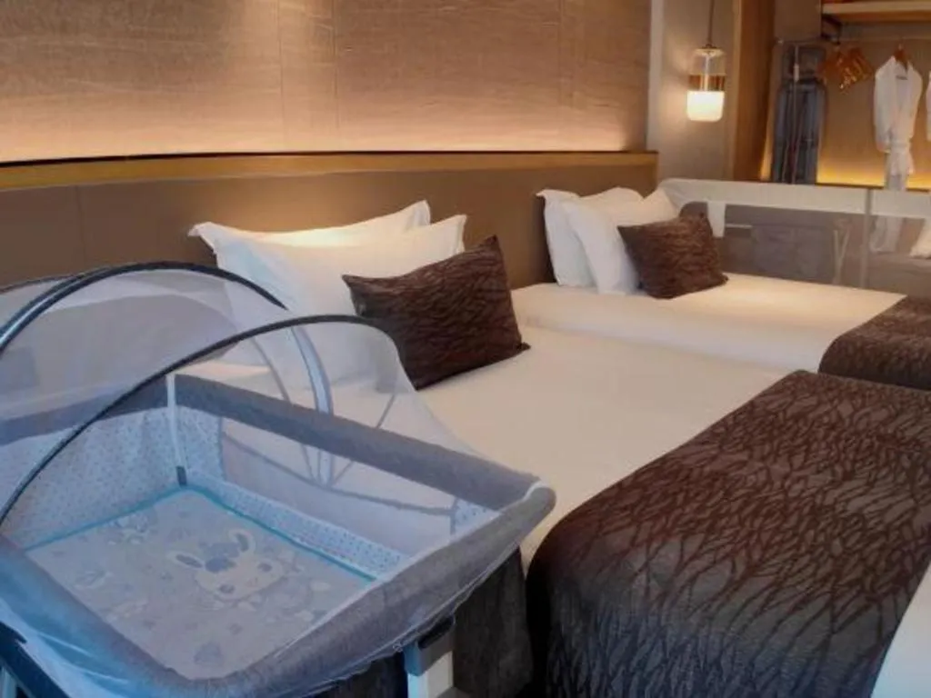 Bed in Taiyi International Hotel