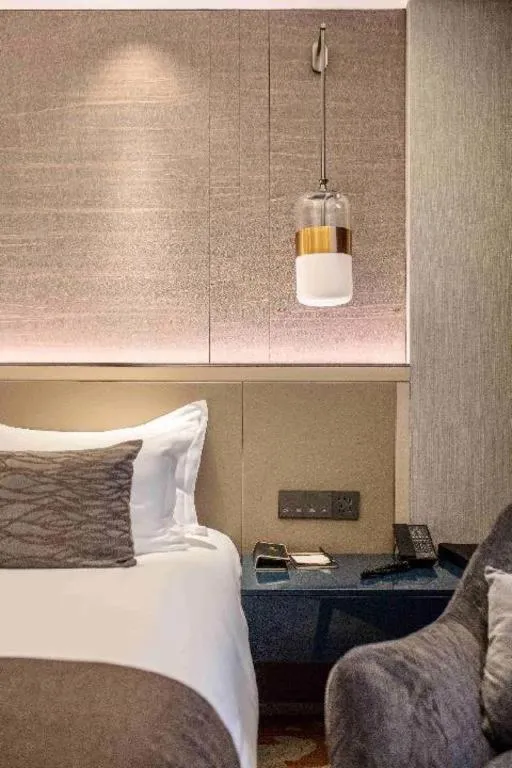 Bed in Taiyi International Hotel