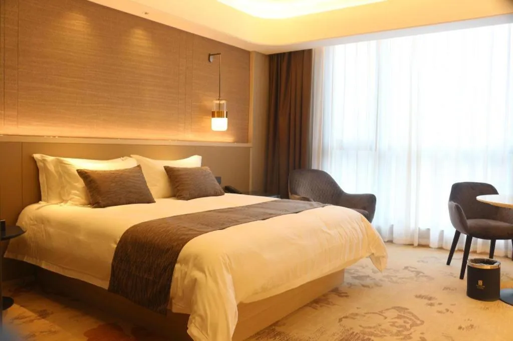 Bed in Taiyi International Hotel
