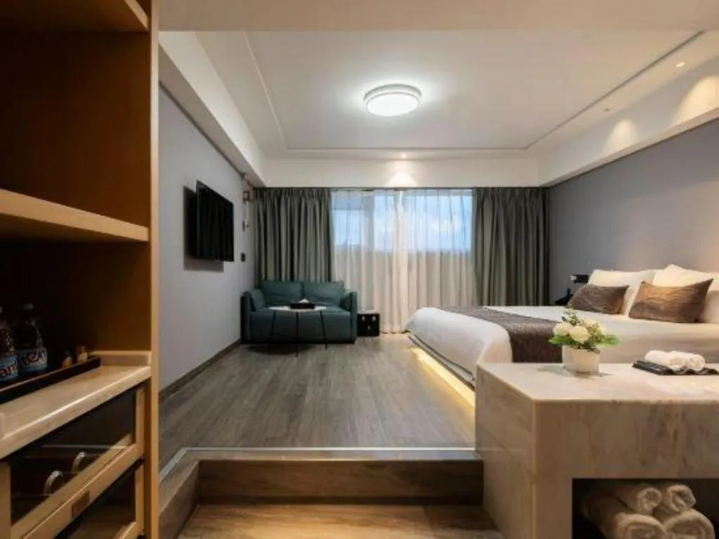 Bed in Taiyi International Hotel