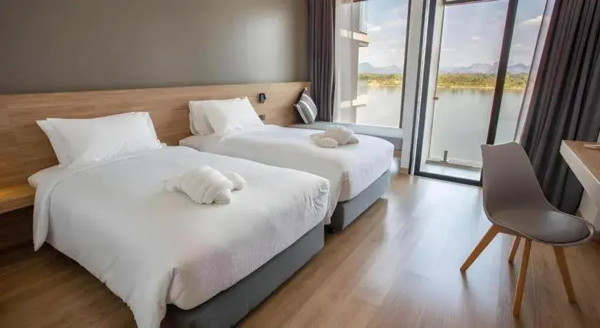 Bed in Chewa Khong Hotel Nakhon Phanom Bed in Chewa Khong Hotel Nakhon Phanom