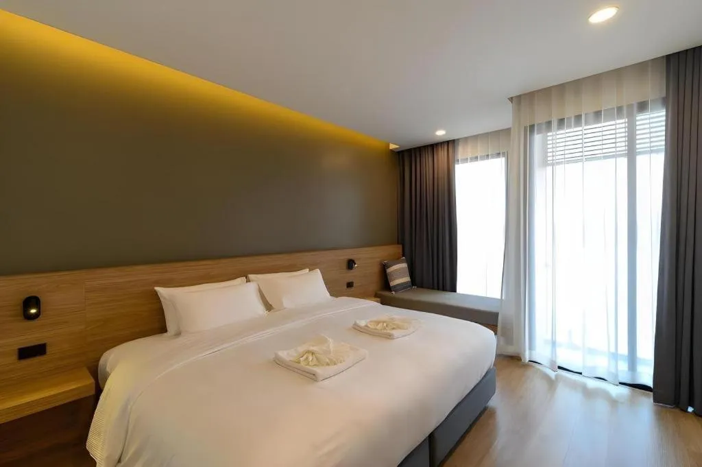 Bed in Chewa Khong Hotel Nakhon Phanom