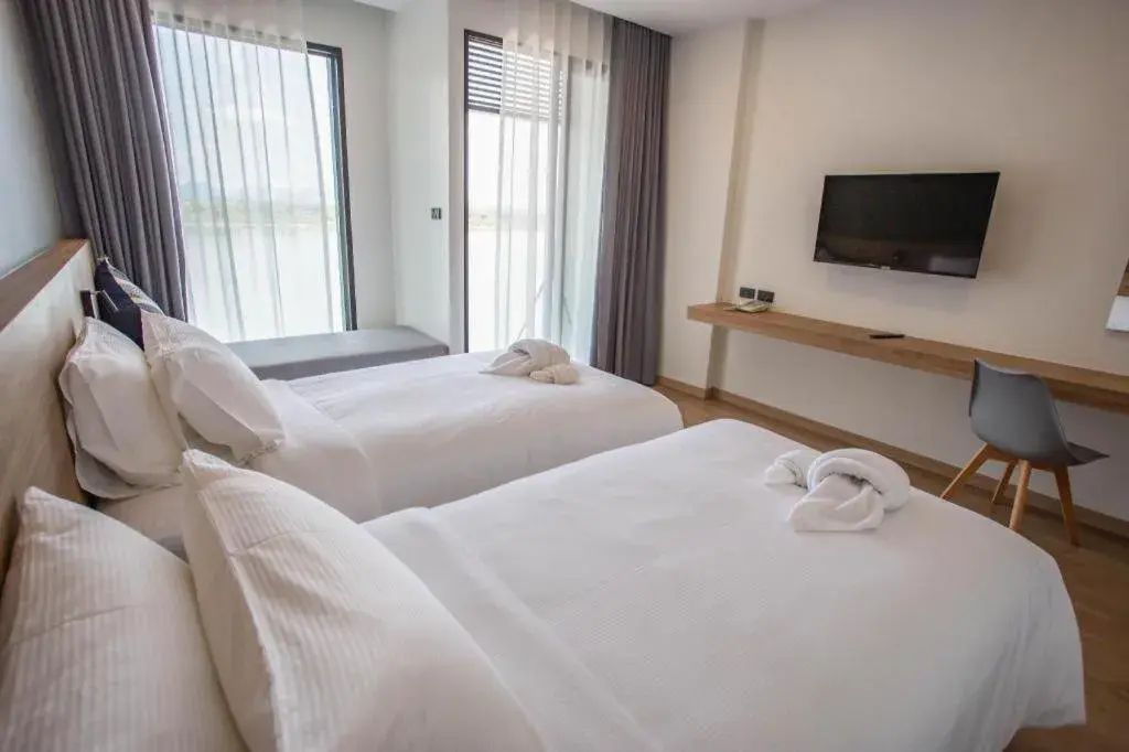 Bed in Chewa Khong Hotel Nakhon Phanom Bed in Chewa Khong Hotel Nakhon Phanom