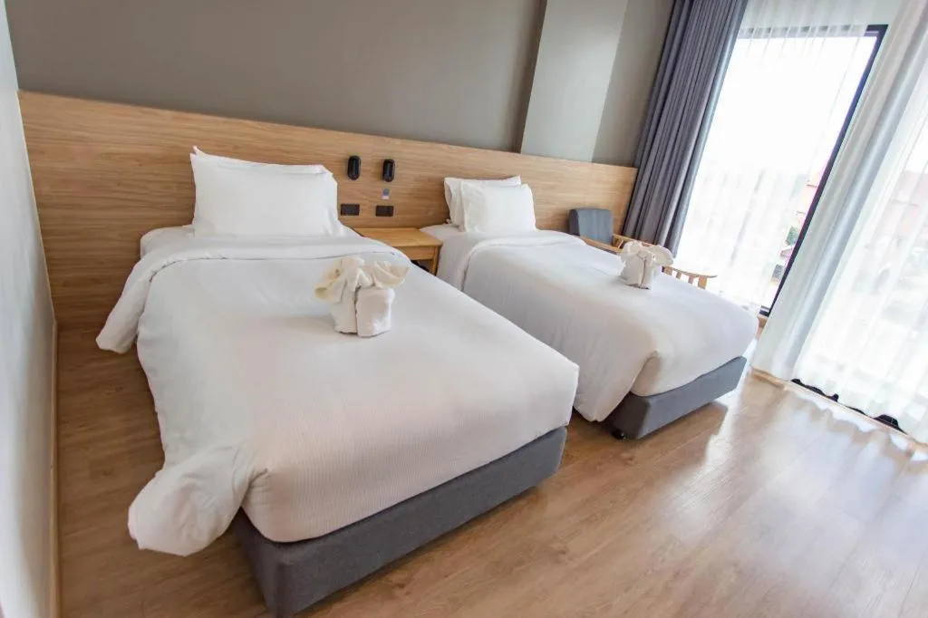 Bed in Chewa Khong Hotel Nakhon Phanom