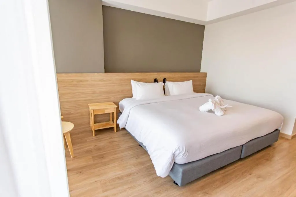 Bed in Chewa Khong Hotel Nakhon Phanom