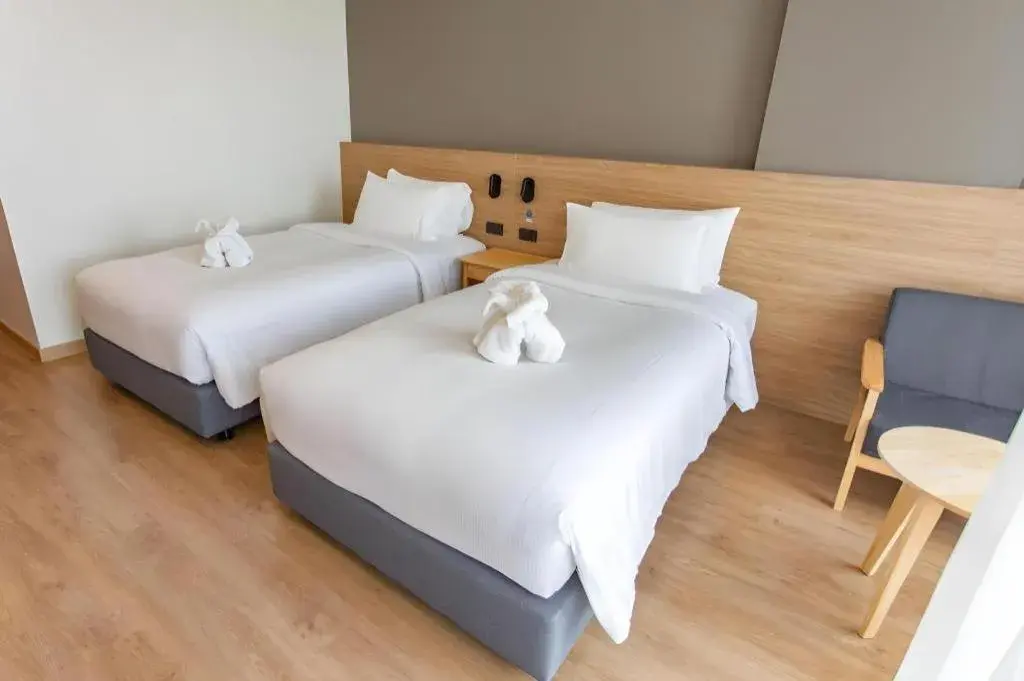 Bed in Chewa Khong Hotel Nakhon Phanom Bed in Chewa Khong Hotel Nakhon Phanom