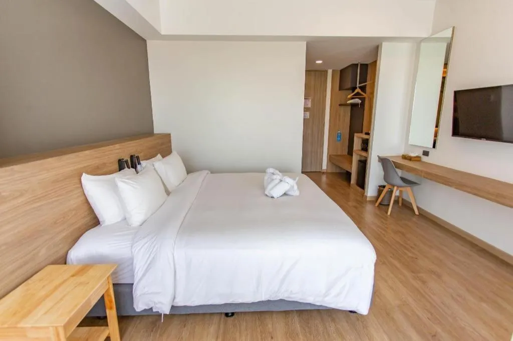 Bed in Chewa Khong Hotel Nakhon Phanom