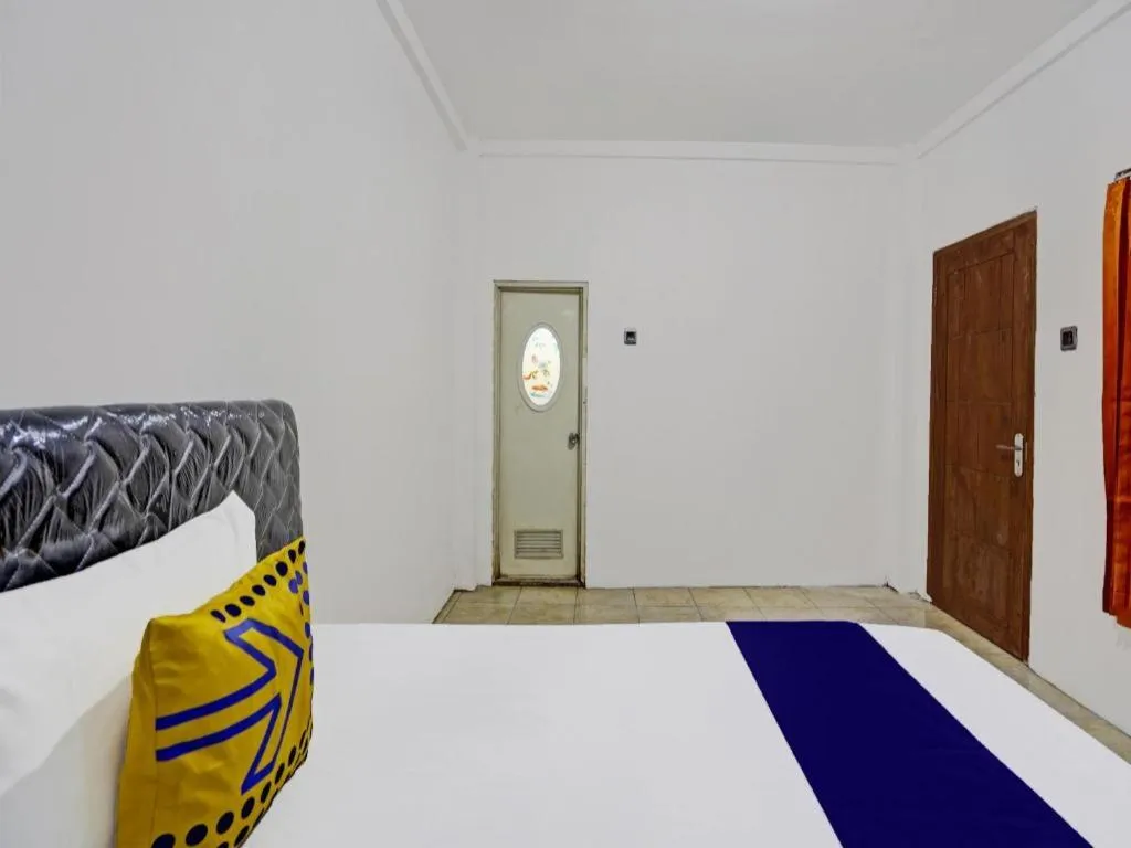 Bed in Hotel O Griya Sandi Residence Family NearPantai Boom