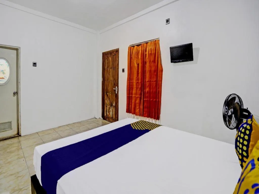 Bed in Hotel O Griya Sandi Residence Family NearPantai Boom