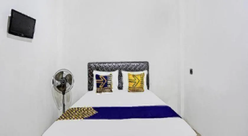 Bed in Hotel O Griya Sandi Residence Family NearPantai Boom