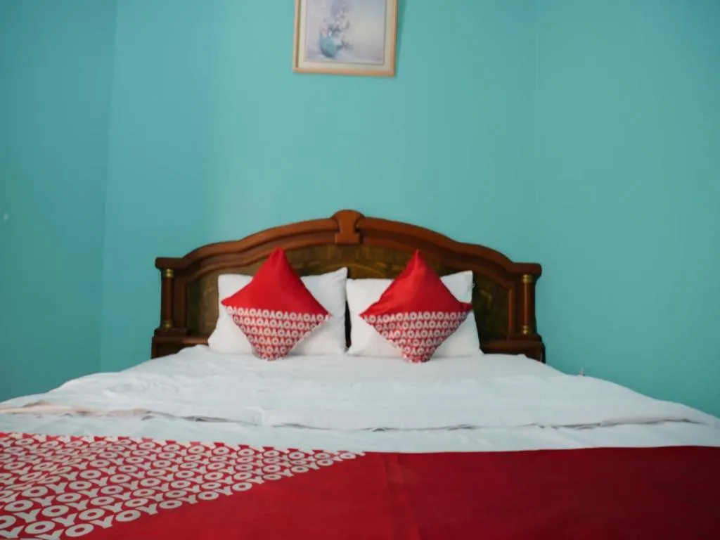 Bed in Hotel O Penginapan Raja