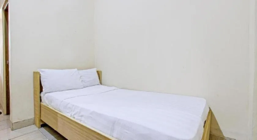 Bed in OYO Life 92663 Karmel 6