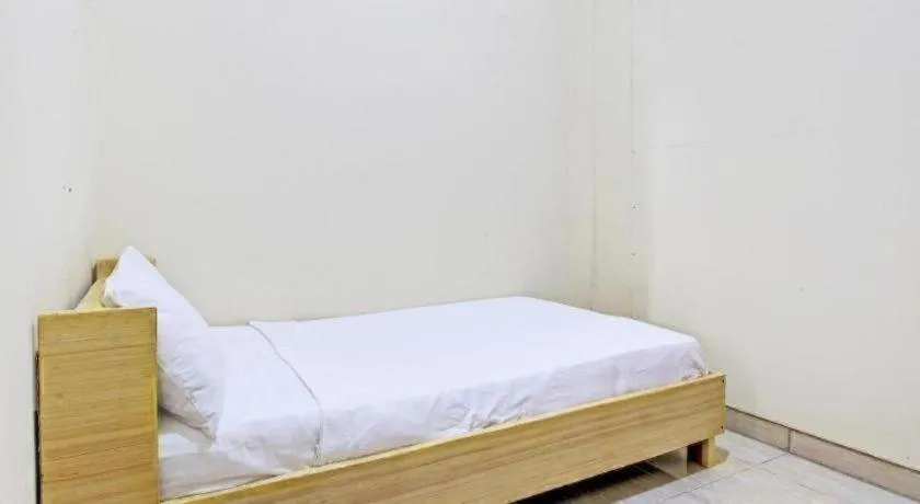 Bed in OYO Life 92663 Karmel 6