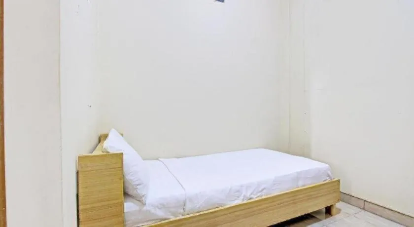 Bed in OYO Life 92663 Karmel 6