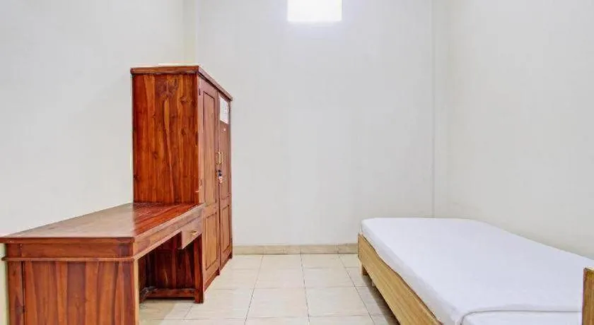 Bed in OYO Life 92663 Karmel 6