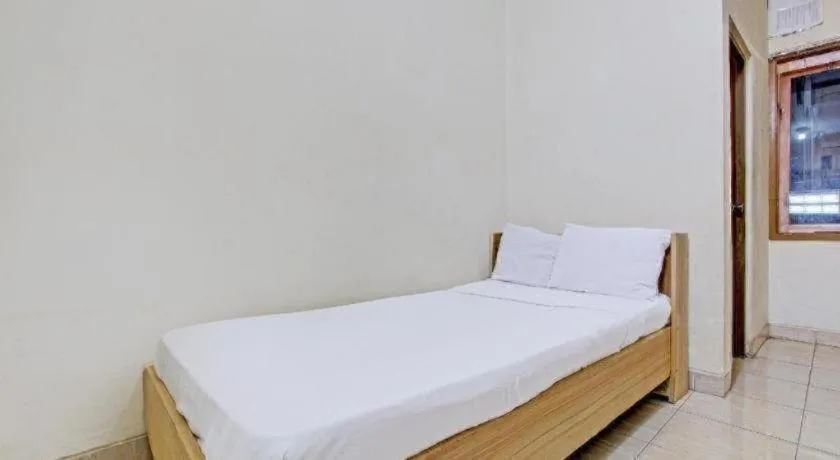 Bed in OYO Life 92663 Karmel 6