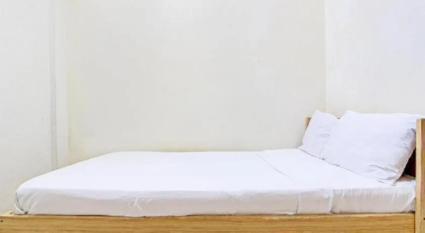 Bed in OYO Life 92663 Karmel 6