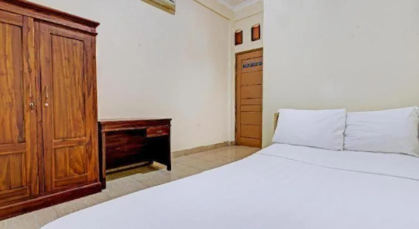 Bed in OYO Life 92663 Karmel 6