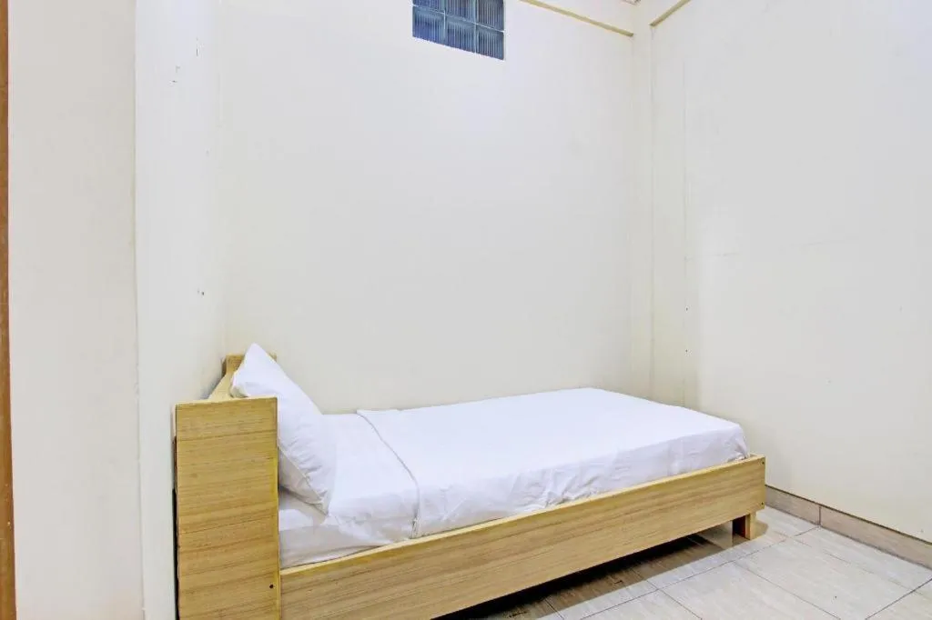 Bed in OYO Life 92663 Karmel 6