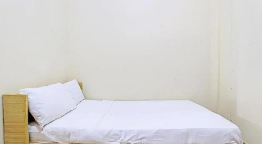 Bed in OYO Life 92663 Karmel 6